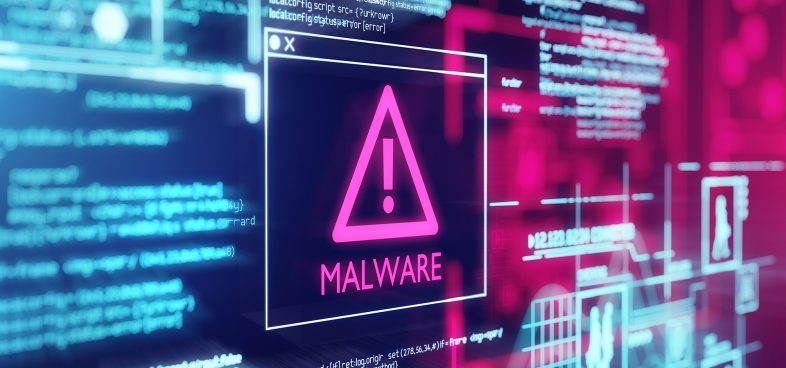 A digital concept showing a large malware alert symbol on a screen, set against a background filled with lines of computer code and network diagrams in shades of blue and pink. The word "MALWARE" prominently displayed within the alert symbol.