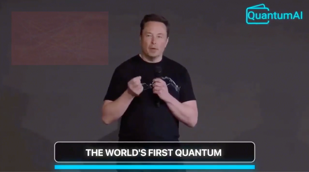 Elon Musk presenting. QuantumAI logo. Caption that reads "THE WORLD'S FIRST QUANTUM.