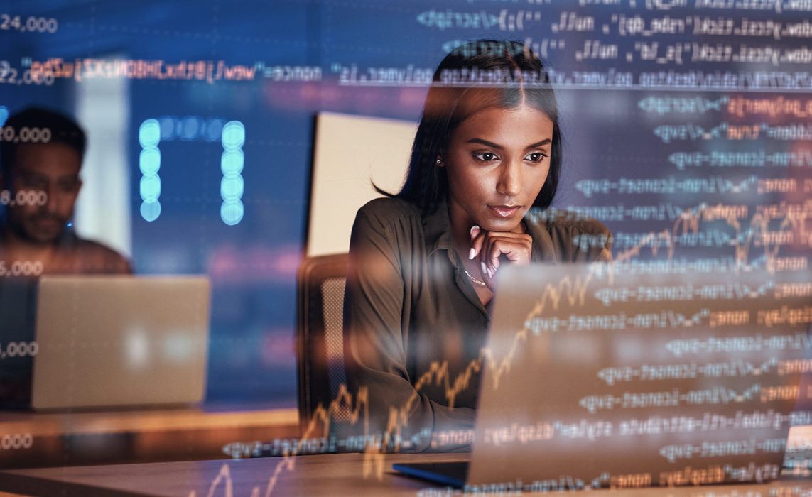 Pictorial representation of Gh0st RAT malware. A woman analyzes code on a computer screen in an office setting, with another individual working in the background.
