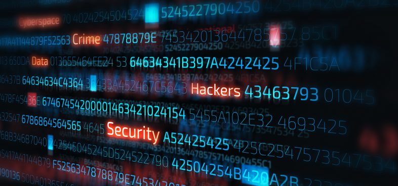 Pictorial representation of TeamPCP. Glowing code on a screen where several word such as Crime, Hackers, and Security are highlighted in a contrasting color.