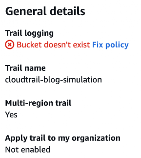 A screenshot of a AWS CloudTrail displaying general details for a trail logging configuration. A red error message states "Bucket doesn't exist" with a "Fix policy" link. "Multi-region trail" is set to Yes, while "Apply trail to my organization" is Not Enabled.
