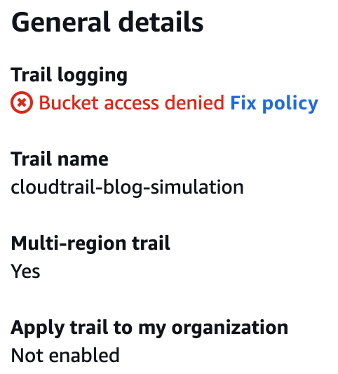 A screenshot of AWS settings page displaying "General details." It shows "Trail logging" with a red icon and the message "Bucket access denied" with a link to "Fix policy." "Multi-region trail" is set to Yes, while "Apply trail to my organization" is Not Enabled.